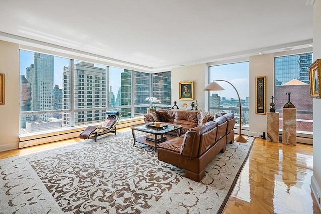 living area with baseboards, a baseboard heating unit, a wall of windows, and a city view