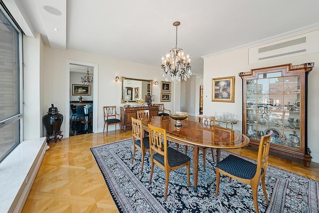 dining room featuring an inviting chandelier and ornamental molding