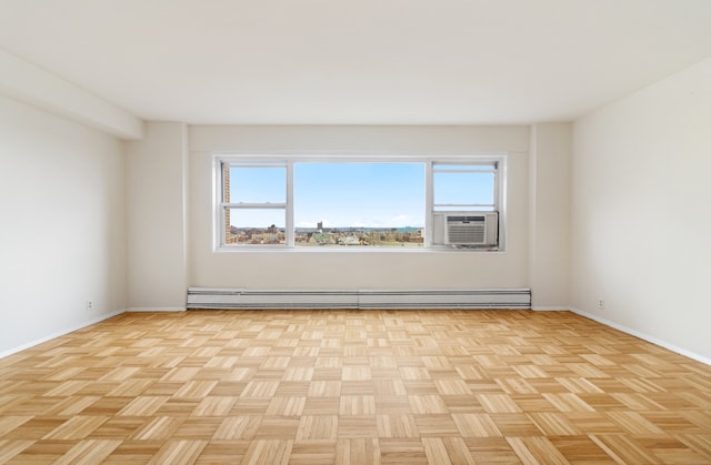 unfurnished room with a baseboard radiator and cooling unit