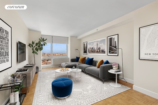 living area with baseboards and visible vents