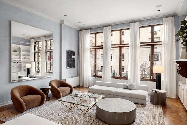 sitting room featuring parquet floors, radiator heating unit, and ornamental molding