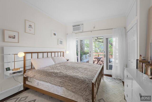 bedroom featuring a wall unit AC, access to exterior, light carpet, and a closet