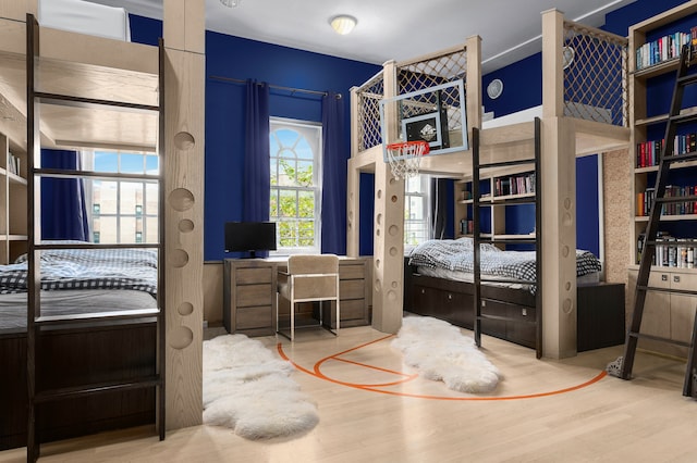 bedroom featuring wood finished floors