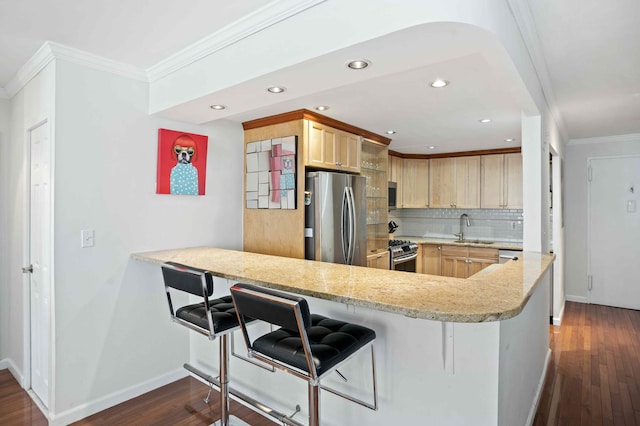 kitchen with dark wood-style floors, light brown cabinetry, stainless steel appliances, crown molding, and tasteful backsplash