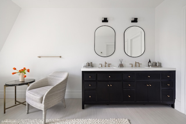 69 W 83rd St, New York City, NY 10024 - bathroom featuring baseboards and double vanity