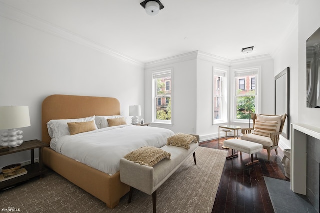 69 W 83rd St, New York City, NY 10024 - bedroom featuring crown molding, dark wood-style flooring, and baseboards