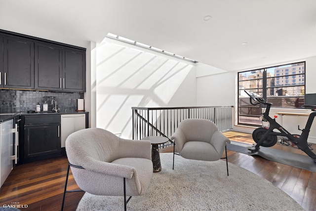 69 W 83rd St, New York City, NY 10024 - living area with wet bar and dark wood-style floors
