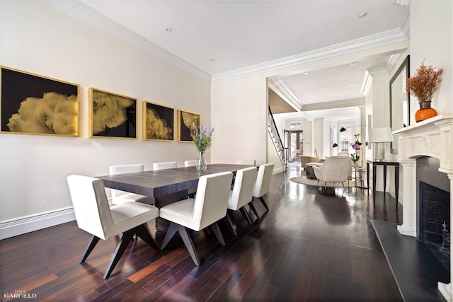 69 W 83rd St, New York City, NY 10024 - dining room featuring dark wood-style floors, ornamental molding, baseboards, stairway, and recessed lighting
