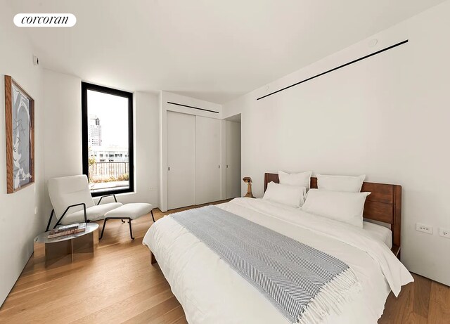 9 Chapel St Phb, Phb, New York City, NY 11201 - bedroom featuring light wood finished floors and a closet