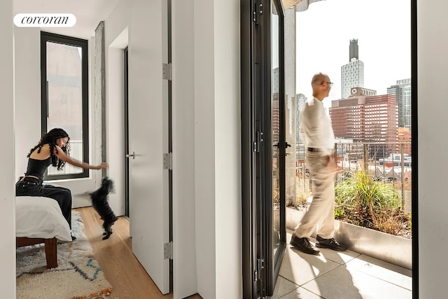 9 Chapel St Phb, Phb, New York City, NY 11201 - bedroom featuring light wood-style flooring and a city view