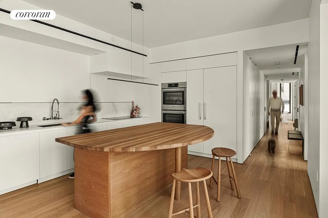 bathroom featuring a freestanding bath
