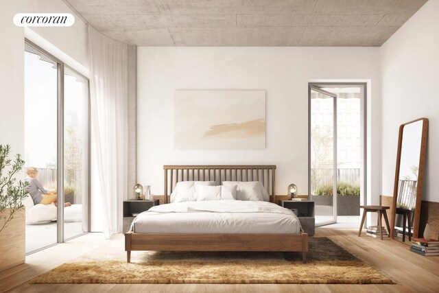 bedroom featuring access to exterior, visible vents, and wood finished floors