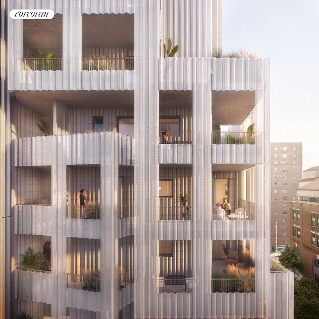 bedroom featuring access to exterior and a view of city