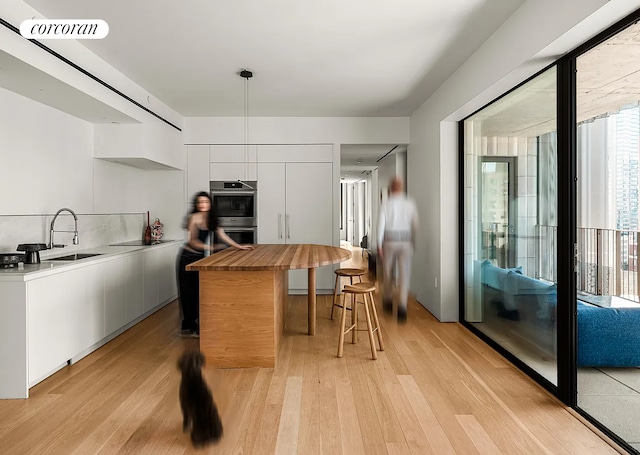 9 Chapel St Phb, Phb, New York City, NY 11201 - kitchen featuring wooden counters, modern cabinets, a sink, and light wood finished floors