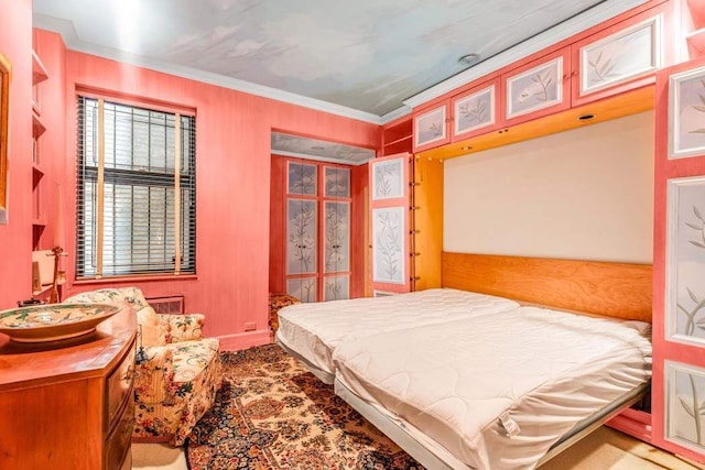 bedroom with crown molding