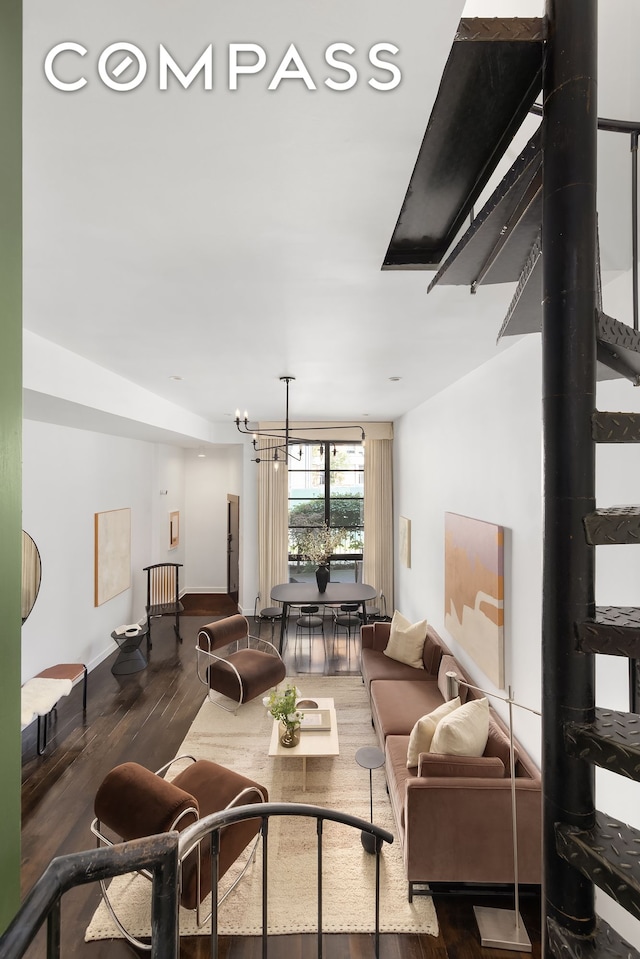 living room featuring dark wood-style floors