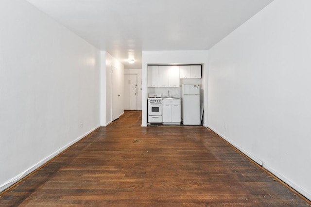 hall with dark hardwood / wood-style floors and sink