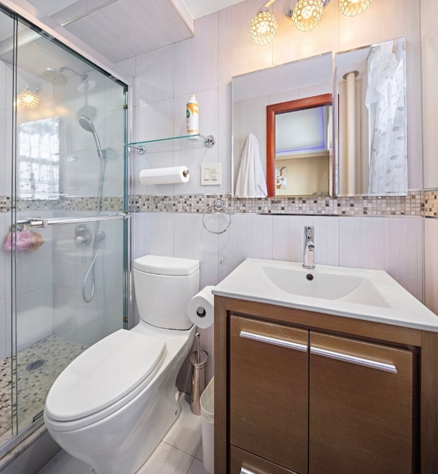 bathroom featuring toilet, tile walls, an enclosed shower, and tile patterned flooring