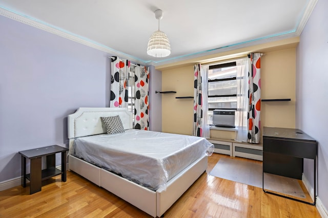 61-35 98th St Unit 15-E, New York City, NY 11374 - bedroom with crown molding and wood finished floors