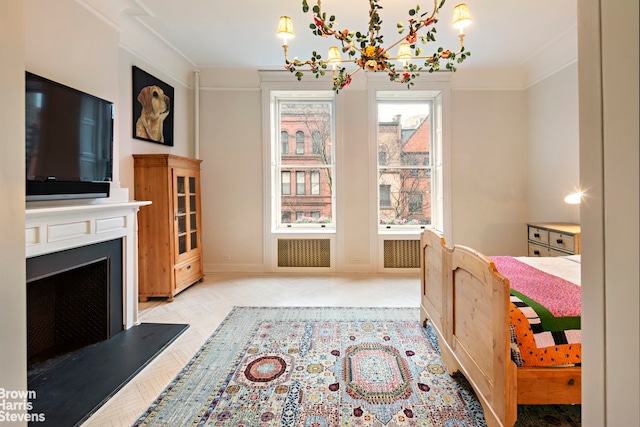 bedroom with ornamental molding, a fireplace, and baseboards