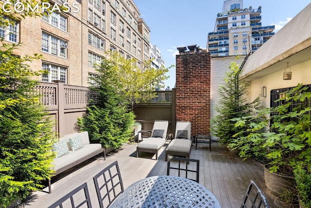 view of patio with an outdoor hangout area and a deck