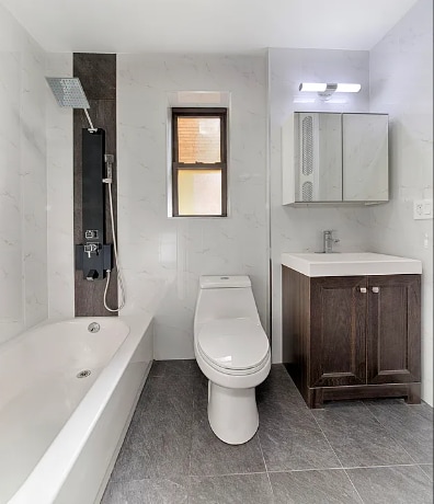 full bath with toilet, tub / shower combination, and vanity