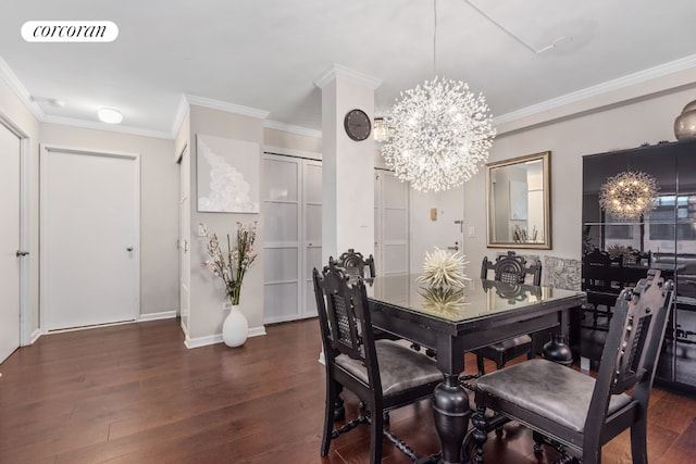 dining area with ornamental molding, dark hardwood / wood-style floors, and a notable chandelier