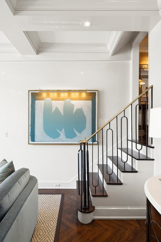 stairway with baseboards and crown molding