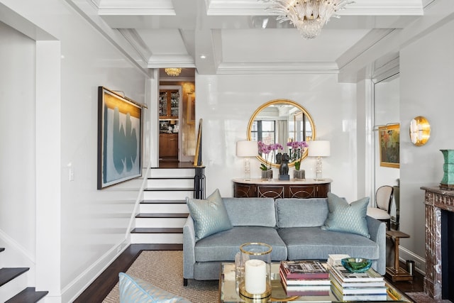 living room featuring crown molding, wood-type flooring, coffered ceiling, and beamed ceiling