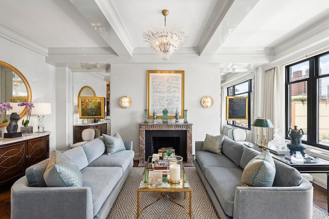 living area with ornamental molding, beam ceiling, a fireplace, and an inviting chandelier