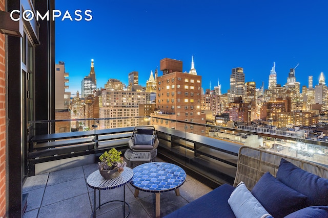 balcony with a view of city lights