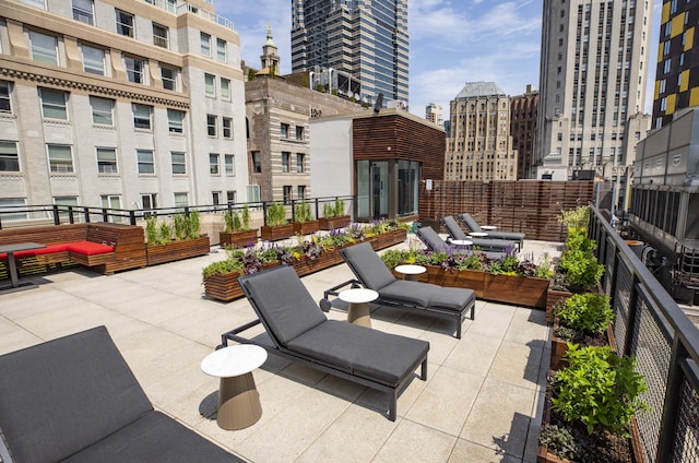 view of patio with a city view