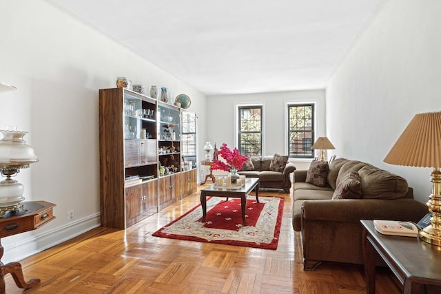 living room featuring parquet floors