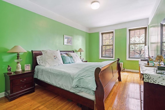 bedroom with light wood-type flooring