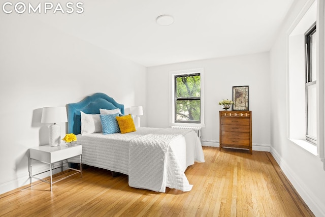 bedroom featuring hardwood / wood-style floors