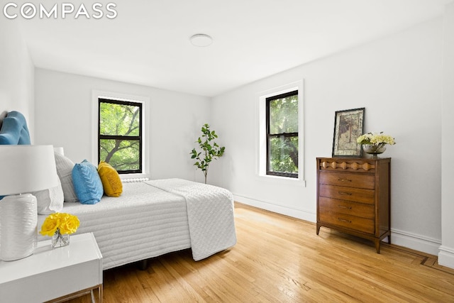 bedroom featuring hardwood / wood-style floors