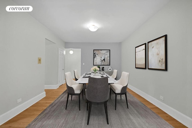 dining room featuring hardwood / wood-style flooring