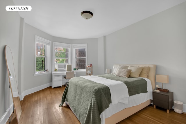 bedroom featuring hardwood / wood-style floors