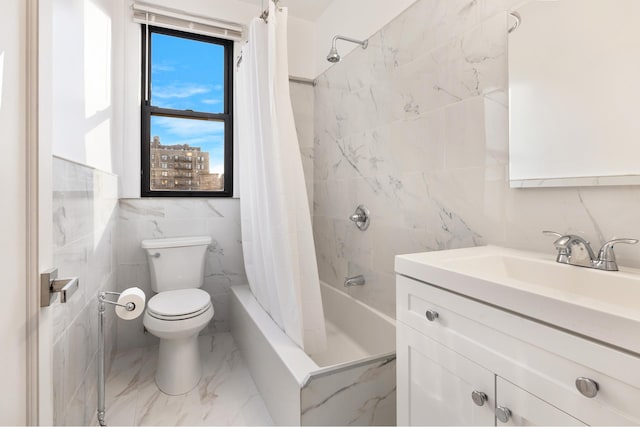 full bathroom featuring vanity, tile walls, toilet, and marble finish floor