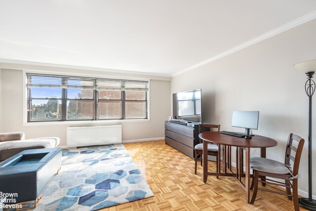 201 E 28th St Unit 17C, New York City, NY 10016 - living room featuring ornamental molding and baseboards