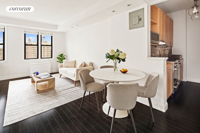 dining room with dark wood-type flooring