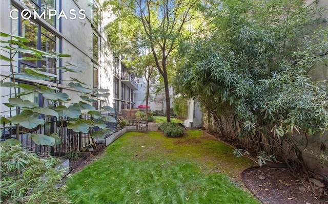 view of yard featuring fence