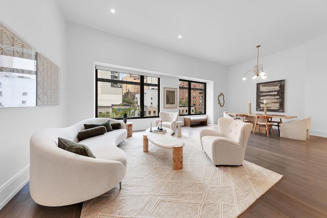 301 E 50th St Unit 4D, New York City, NY 10022 - living area with a chandelier, wood finished floors, baseboards, and recessed lighting