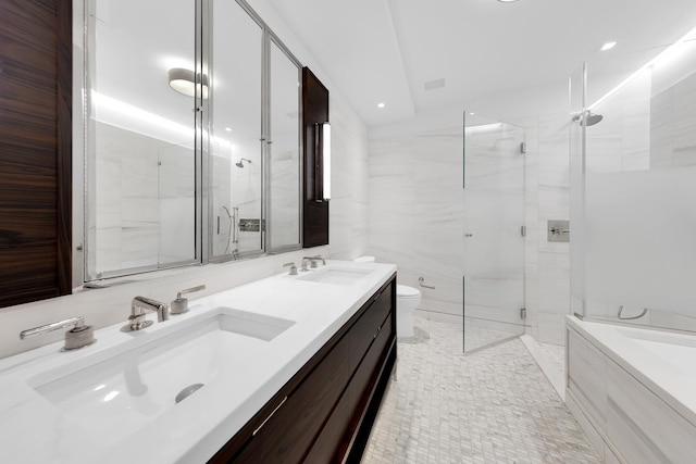 301 E 50th St Unit 4D, New York City, NY 10022 - full bathroom featuring a stall shower, toilet, double vanity, and recessed lighting