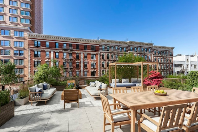 view of patio featuring outdoor dining area and outdoor lounge area