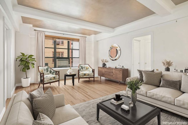 living room featuring hardwood / wood-style floors and beam ceiling