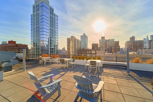 view of patio / terrace featuring a city view