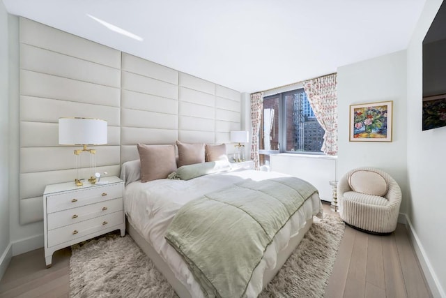 bedroom featuring light wood-type flooring