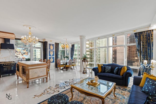 living area with an inviting chandelier and crown molding
