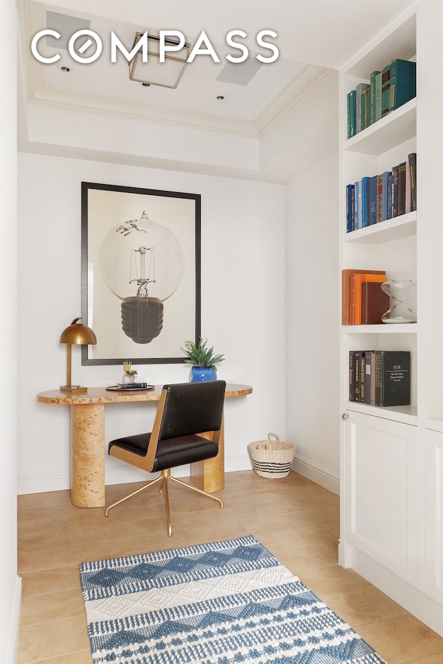 office space featuring crown molding, baseboards, recessed lighting, wood finished floors, and a raised ceiling